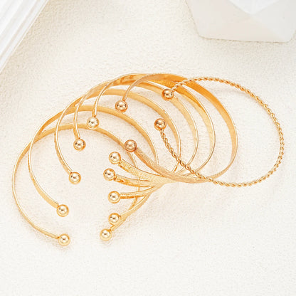 7-Piece Gold Punk Bracelet Set for Women
