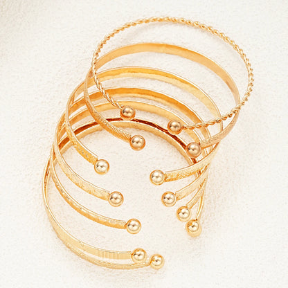 7-Piece Gold Punk Bracelet Set for Women
